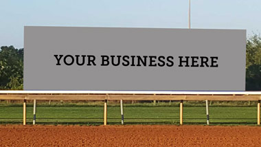 sponsorship sign at Retama Park says "Your Business Here"